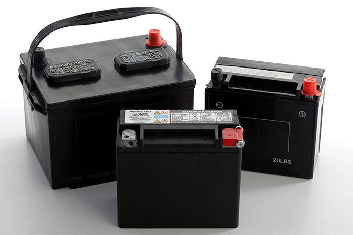 Image of three different batteries on a white background