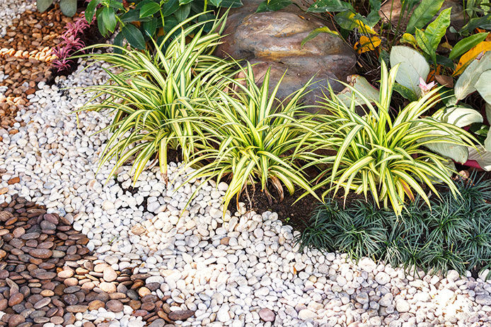 Rock landscaping outside of a residential home