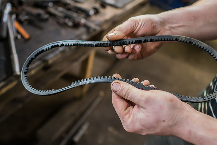 Man holding a rubber belt