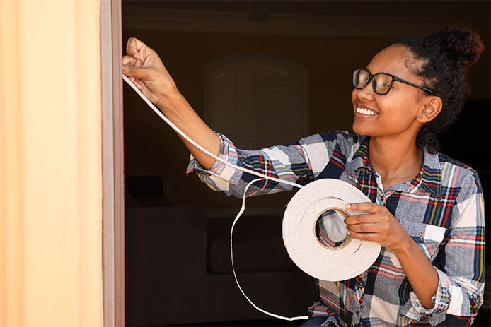 Weather Stripping African American Woman Smiles 