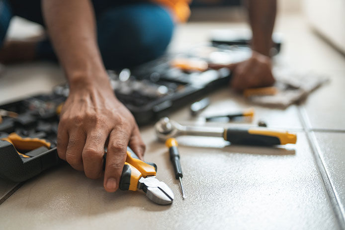 Man holding tools