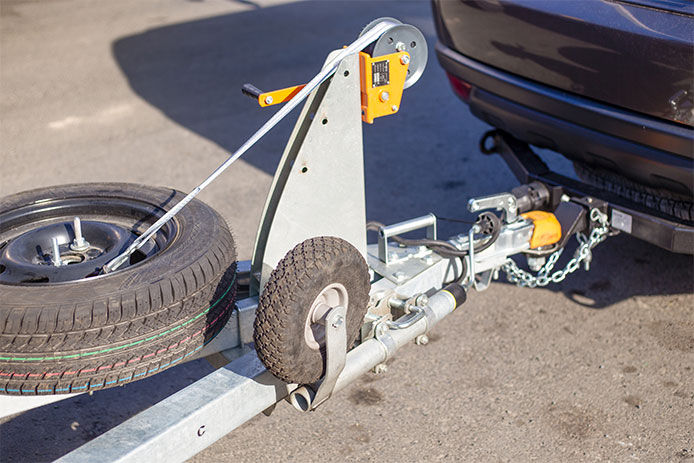 Tow hitch for towing a trailer by a passenger car