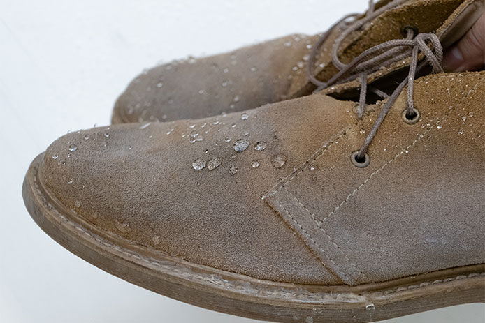 Waterdrops on leather shoes