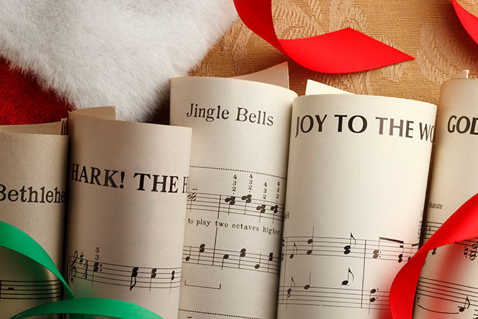 Rolled up sheets of holiday music