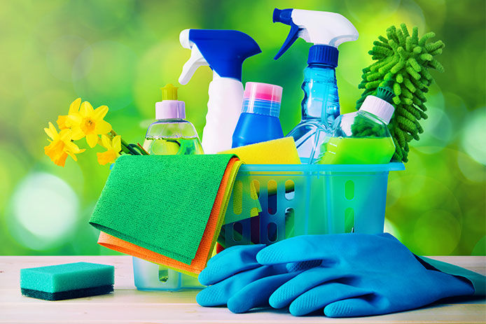 A basket of cleaning supplies