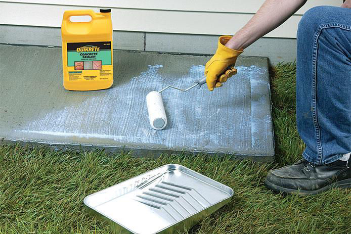 Applying concrete sealer