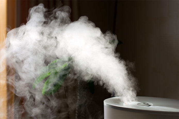 Close up of steam rising out of a humidifer