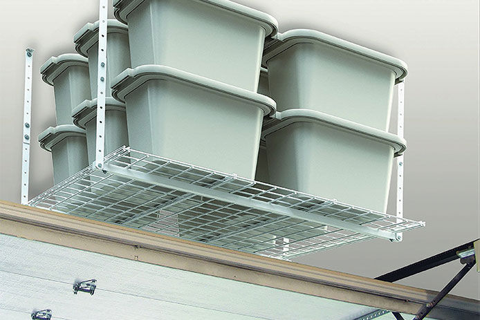 Storage bins hanging from a garage ceiling