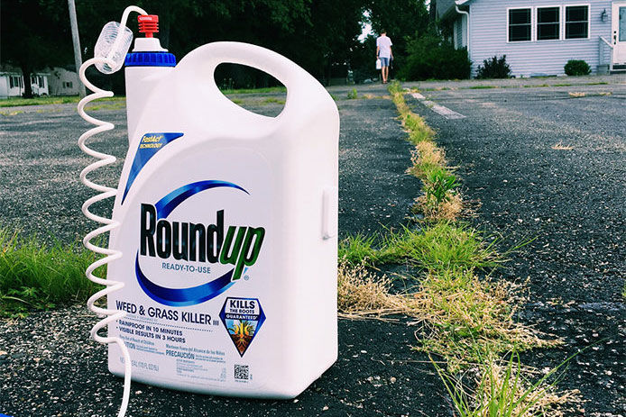 A close up of a bottle of roundup 
