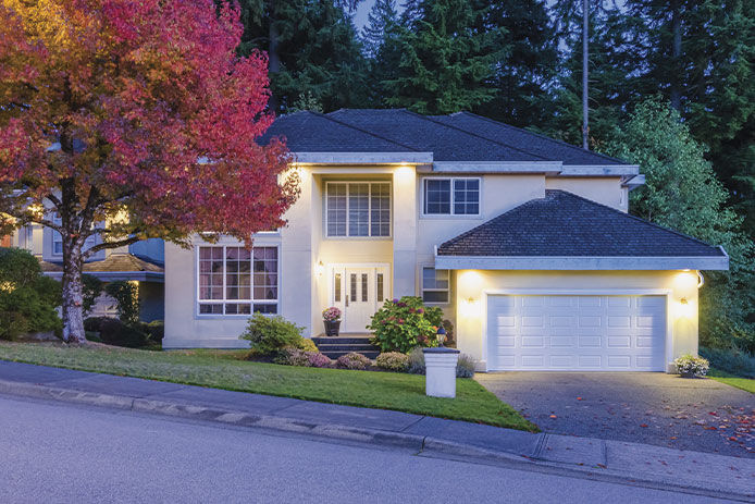 Beauty shop of house exterior from the street with light on the outside