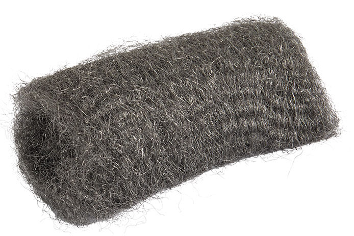 A piece of steel wool against a white background