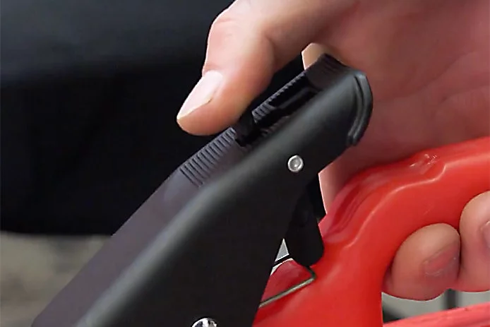 Showing how to release the thumb safety trigger
