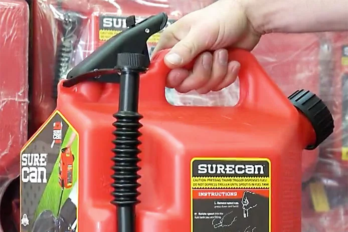 Replacing the spout in an upright position with its cap on