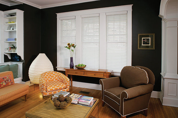 Blinds covering a window in a living room