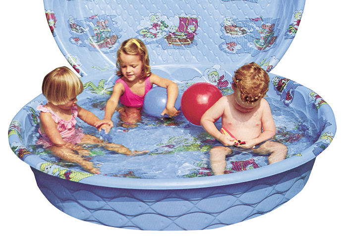 Children playing in a poly pool