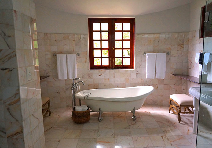 A bathroom with tiled floor