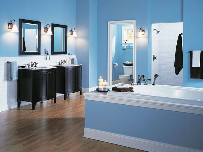 A bathroom with two vanities