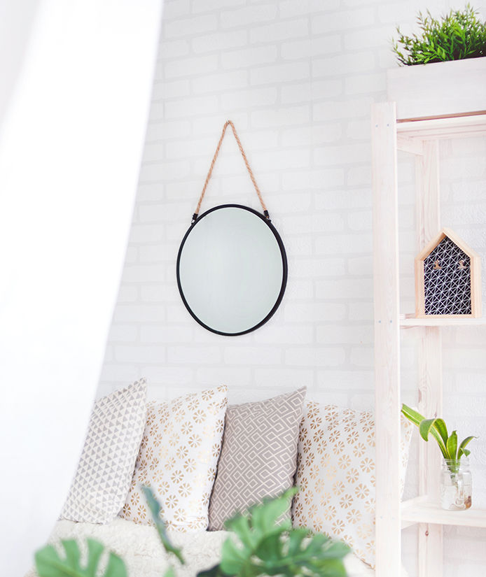 Mirror hanging in living room