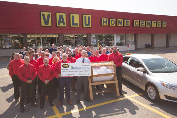 Valu presents Habitat for Humanity with a check for $108,300