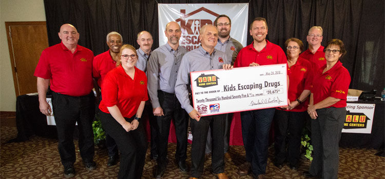 Valu Home Centers presenting $20,675 to Kids Escaping Drugs