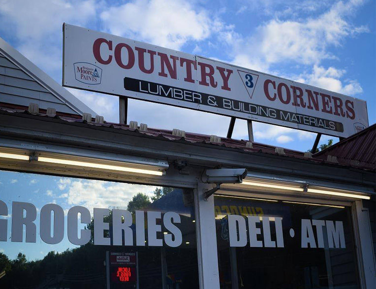 country 3 corners store sign
