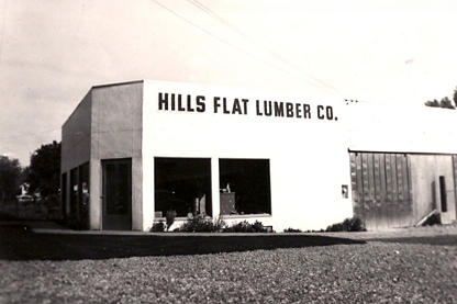 An old photo of a Hills Flat Lumber storefront