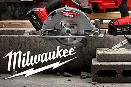 The full line of Milwaukee power tools arranged in a construction type setting