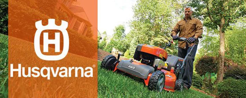 man using push lawnmower