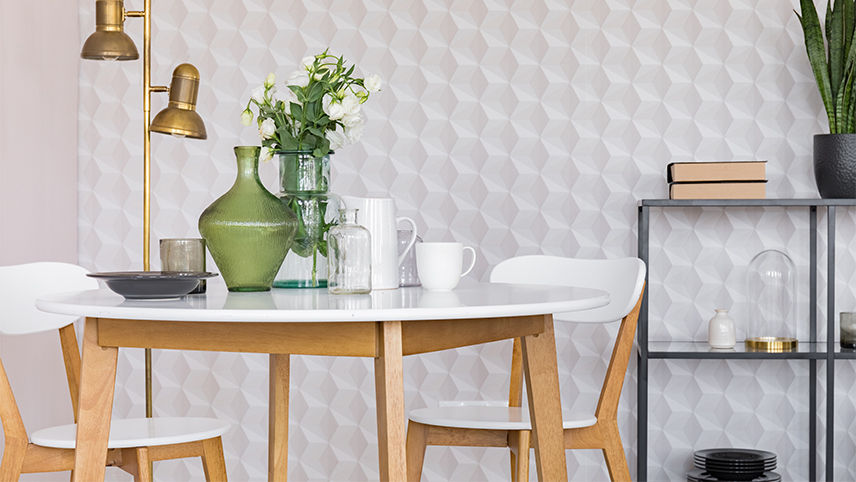 Textured accent wall using wallpaper in dining room