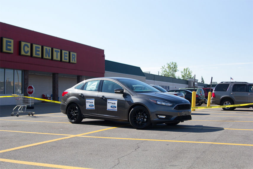 Ford Fusion car in parking lot 