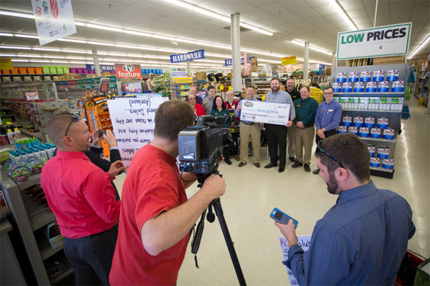 The news filming Valu Home Centers donation to the Make-A-Wish Foundation