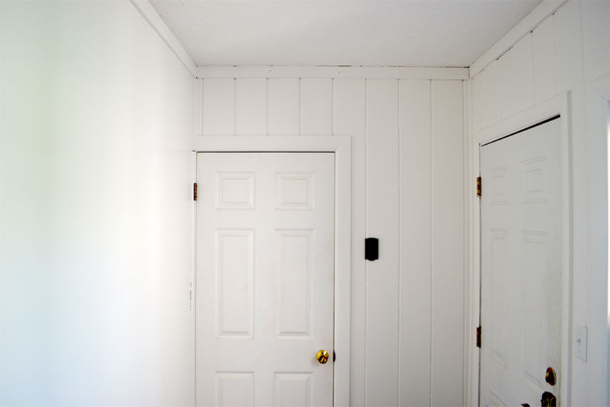 Freshly painted white mudroom