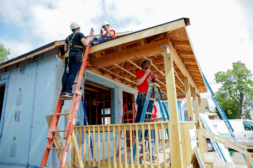 Valu crew working on the front porch 