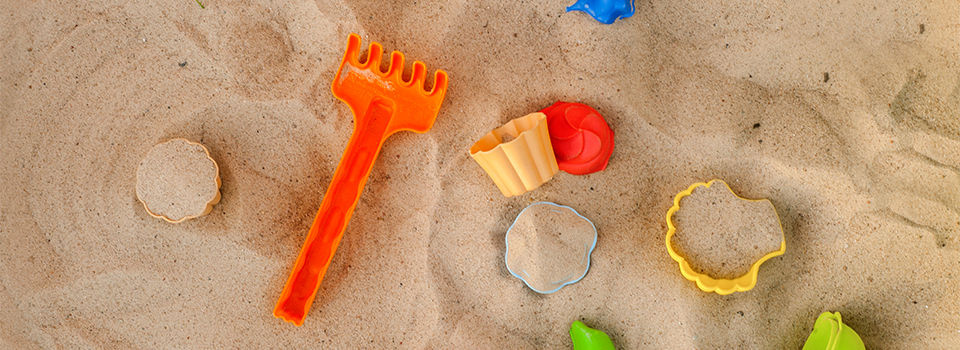 Sandbox with toys