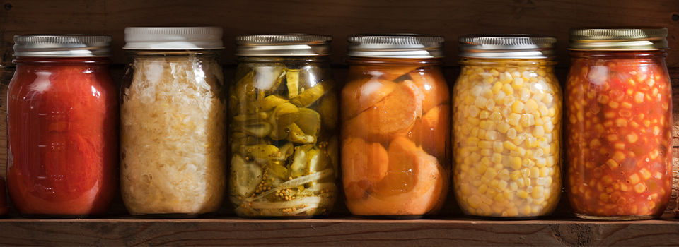 Canned food sitting on a shelf