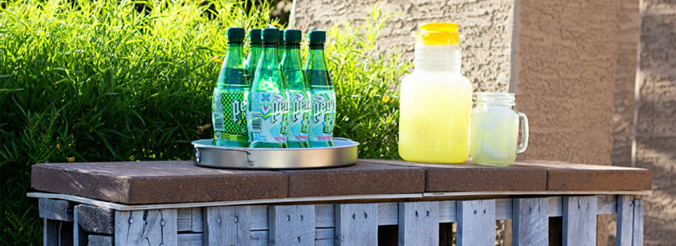 Drinks siting on a diy patio pallet bar