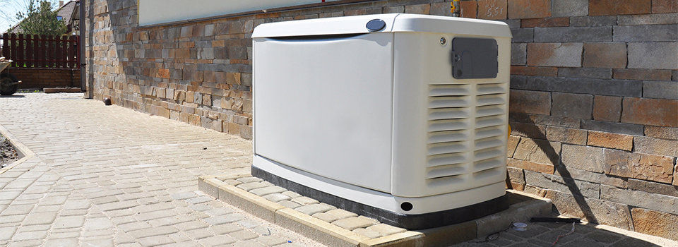 Home standby generator outside a home 