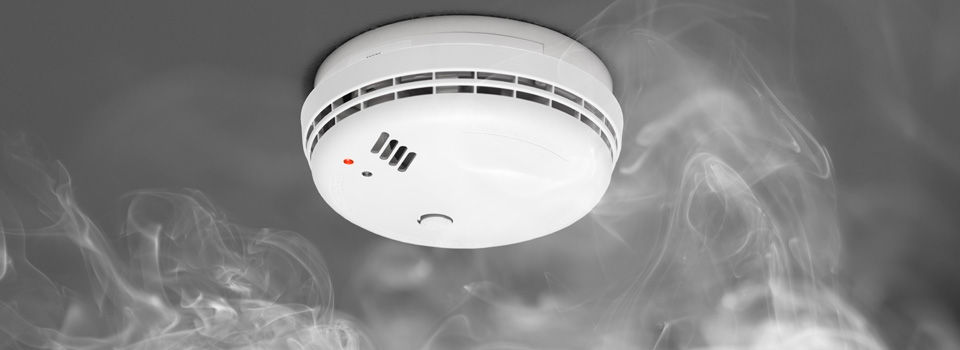 smoke detector with smoke around it
