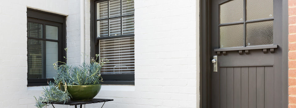 White brick with grey door