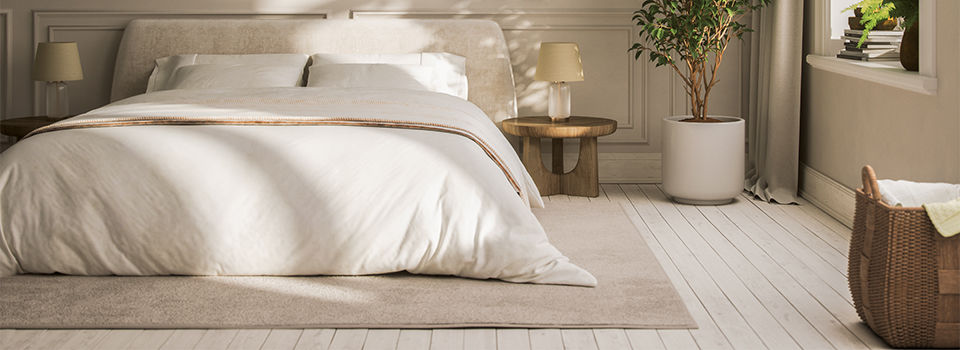 White hardwood floors in a bedroom