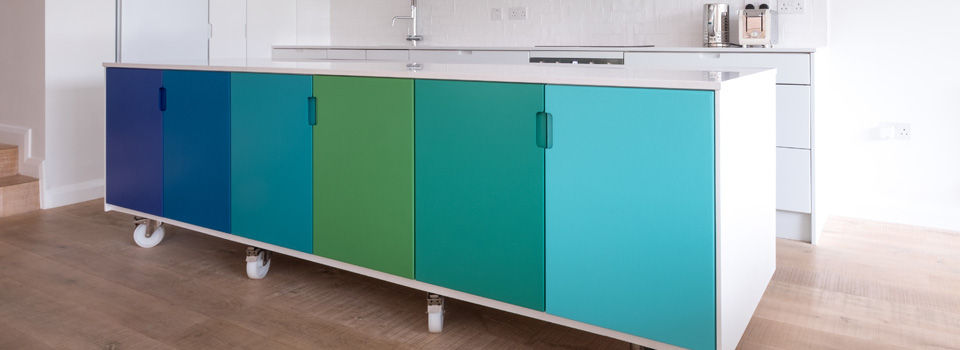 blue and green painted kitchen cabinets