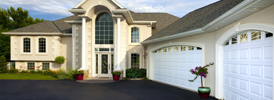 house with an asphalt sealed driveway