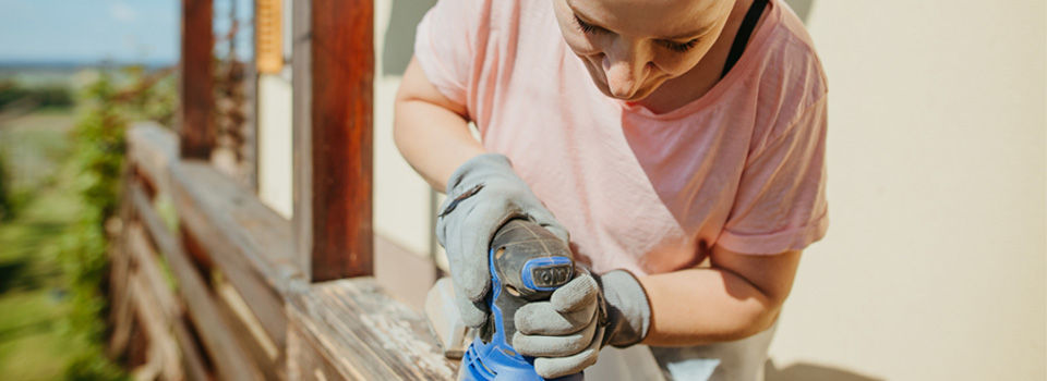 Woman Sanding