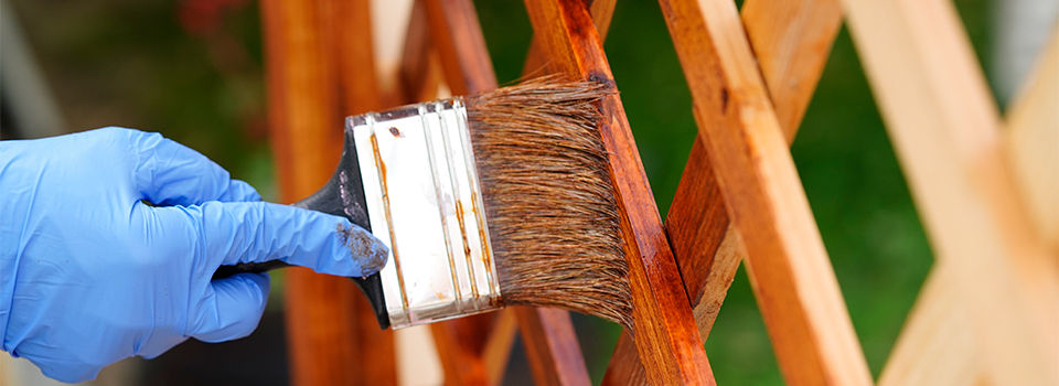 Staining wooden fence