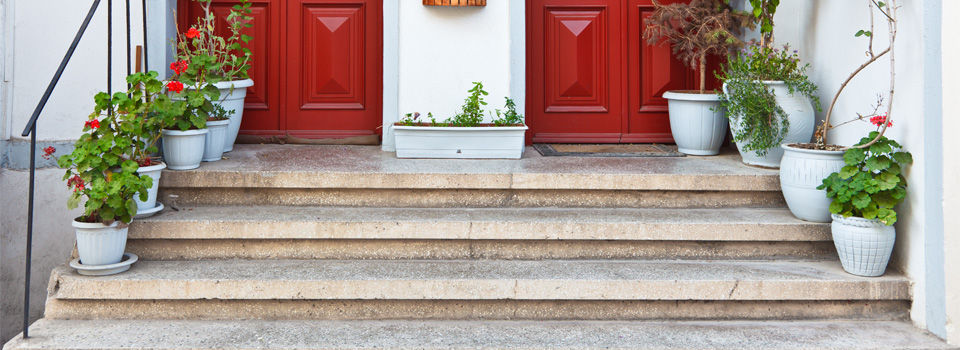 home entrance with concrete steps