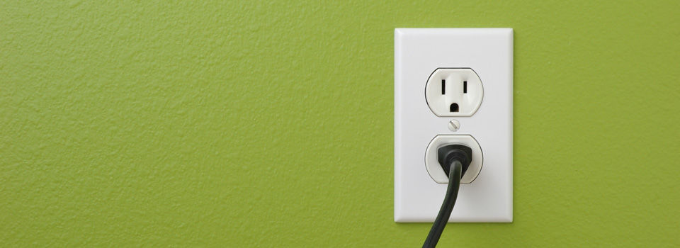 cord plugged into wall outlet