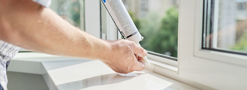 Caulking a window
