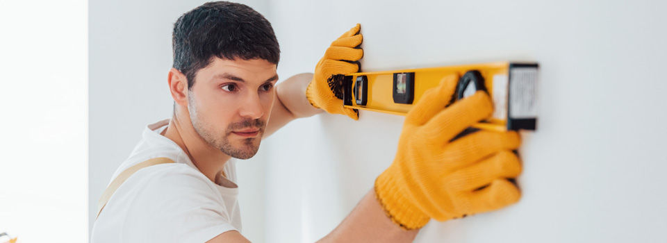man holding a level