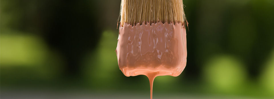 Paintbrush dripping paint