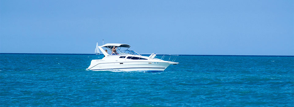 White yacht out on the open ocean 